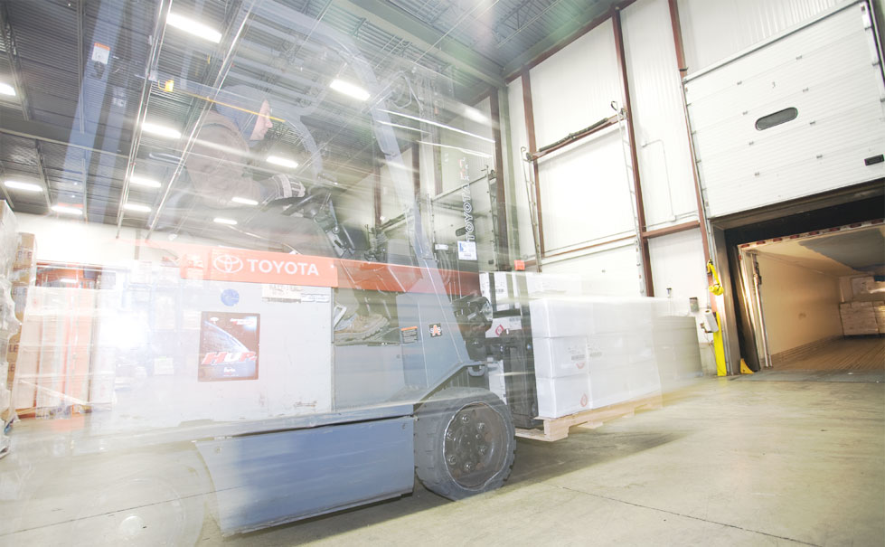 Fork truck carriage bumper in use